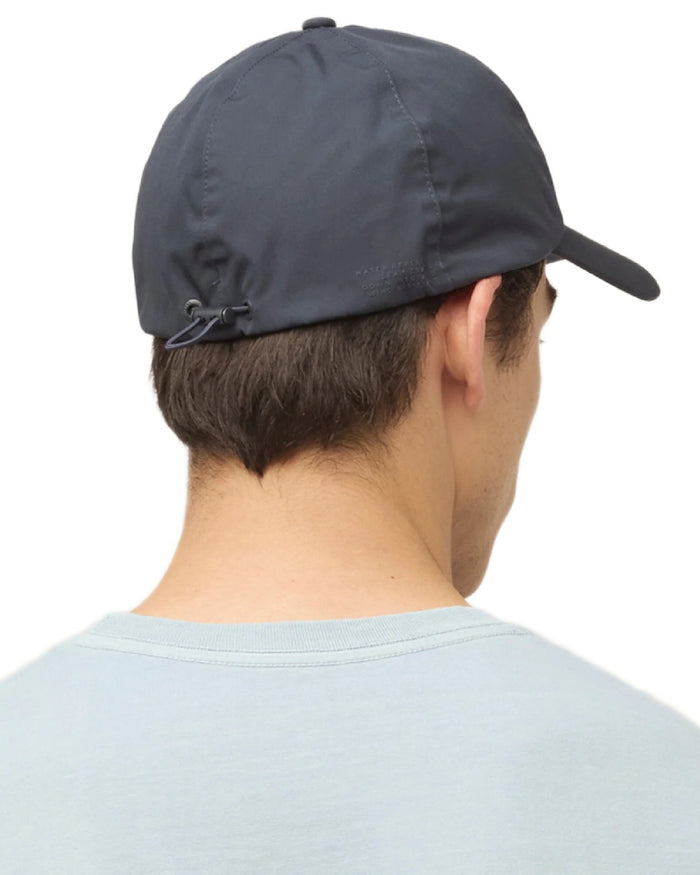 Dark Navy Coloured Tilley The Thermashield Cap on white background #colour_dark-navy