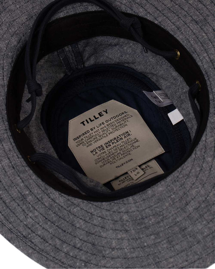 Navy Coloured Tilley TMH55 Organic Airflo Sun Hat on white background #colour_navy