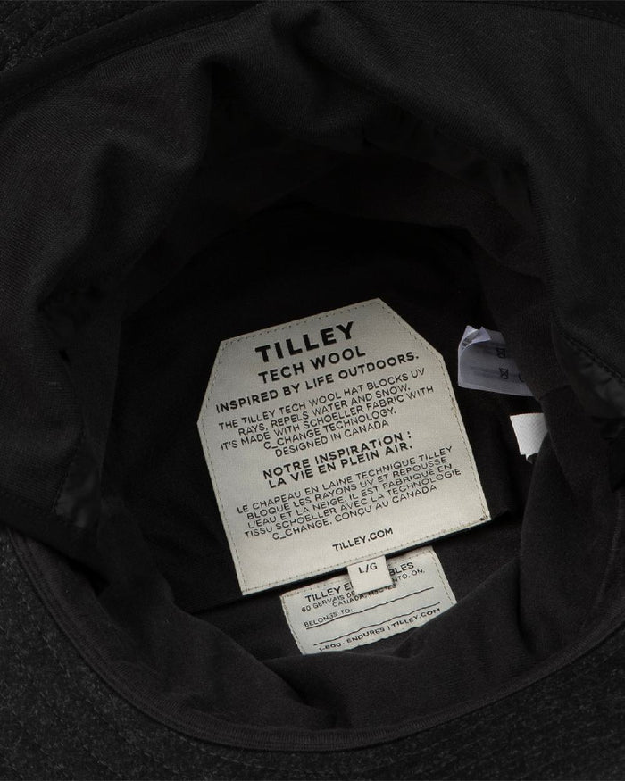 Black coloured Tilley TTW2 Tec Wool Bucket Hat on white background #colour_black