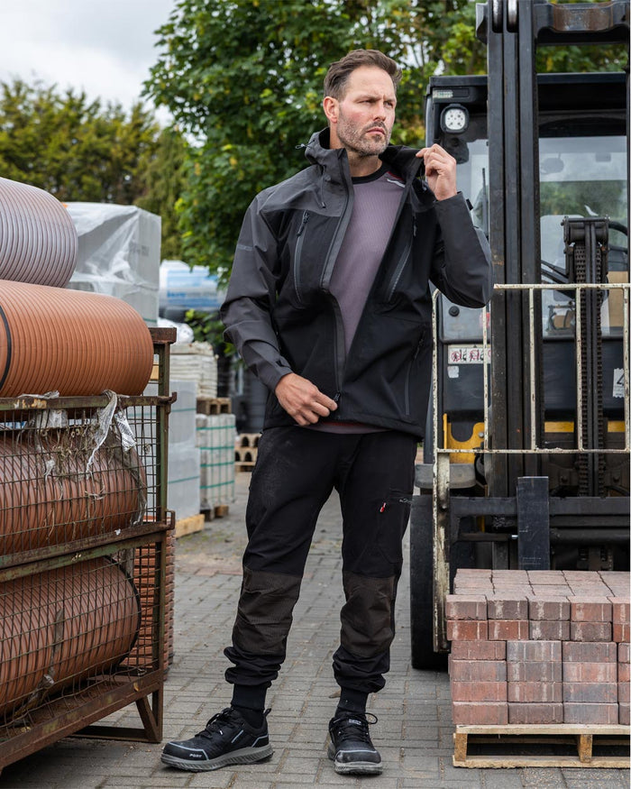 Black coloured TuffStuff ProShell Jacket on urban background #colour_black