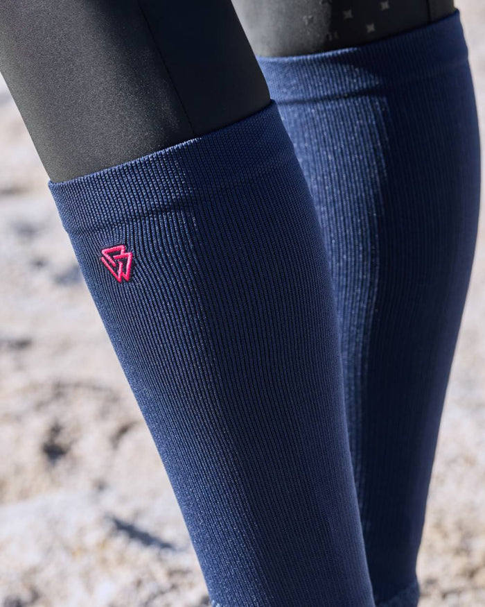 Navy Bright Pink coloured Weatherbeeta Compression Knee Length Riding Socks on outdoor background #colour_navy-bright-pink