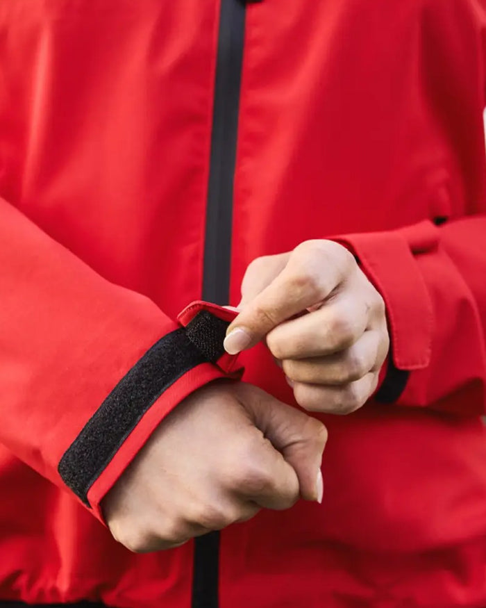 Bittersweet Coloured WeatherBeeta Jackson Waterproof Jacket On A White Background #colour_bittersweet-red