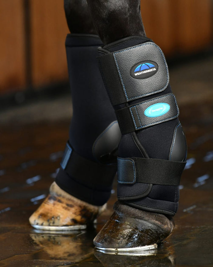 Black Coloured WeatherBeeta Therapy-Tec II Ultra Cool Ice Boots on horse background #colour_black