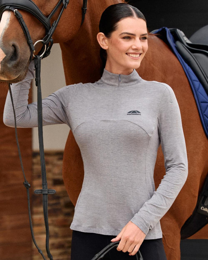 Navy coloured WeatherBeeta Womens 37.5 Lightweight Performance Long Sleeve Quarter Zip Top on outdoor background #colour_navy