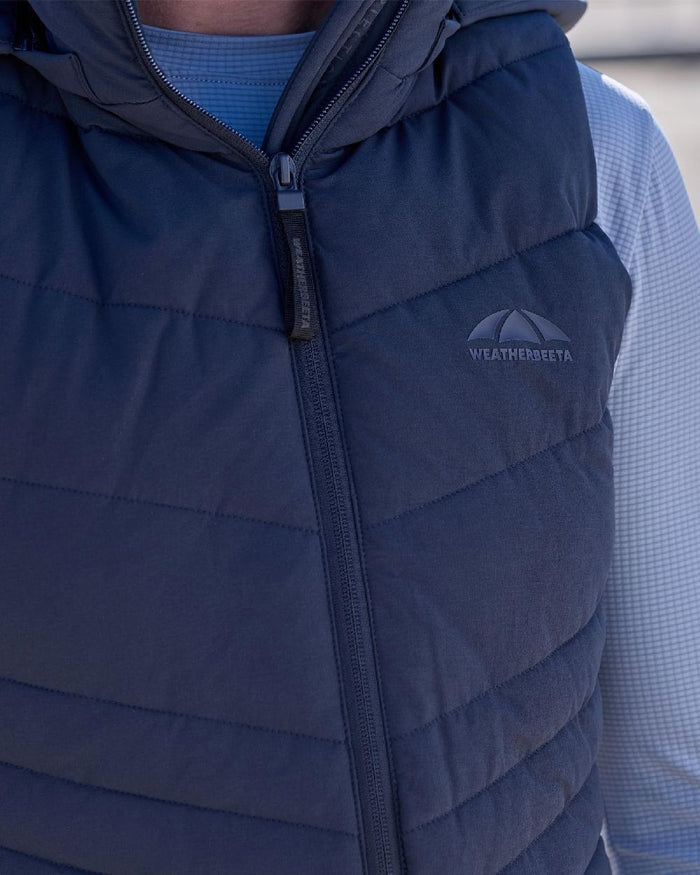 Navy Coloured WeatherBeeta Womens Insulated Vest on outdoor background #colour_navy