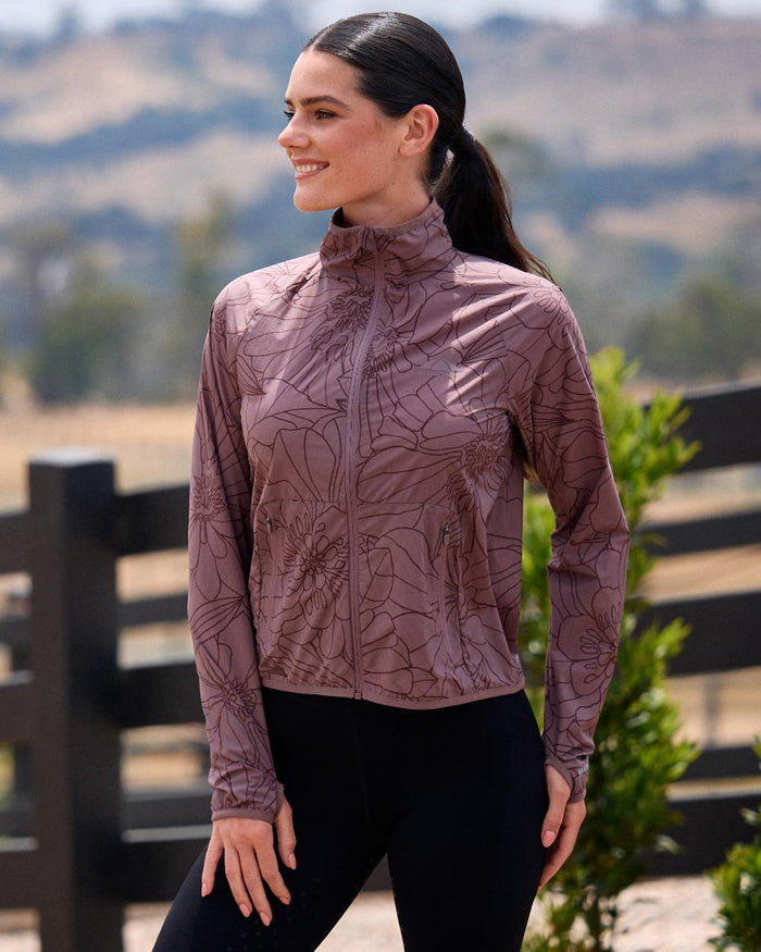 Mauve Wine coloured WeatherBeeta Womens Lightweight UV Jacket on outdoor background #colour_mauve-wine