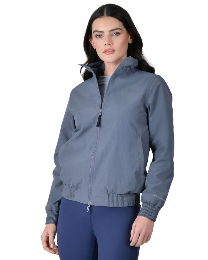 Slate Blue coloured WeatherBeeta Womens Waterproof Team Jacket on white background #colour_slate-blue