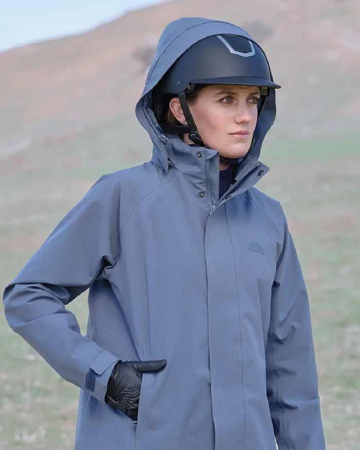 Slate Blue Coloured WeatherBeeta Womens Windbreaker Longline Riding Jacket on outdoor background #colour_slate-blue