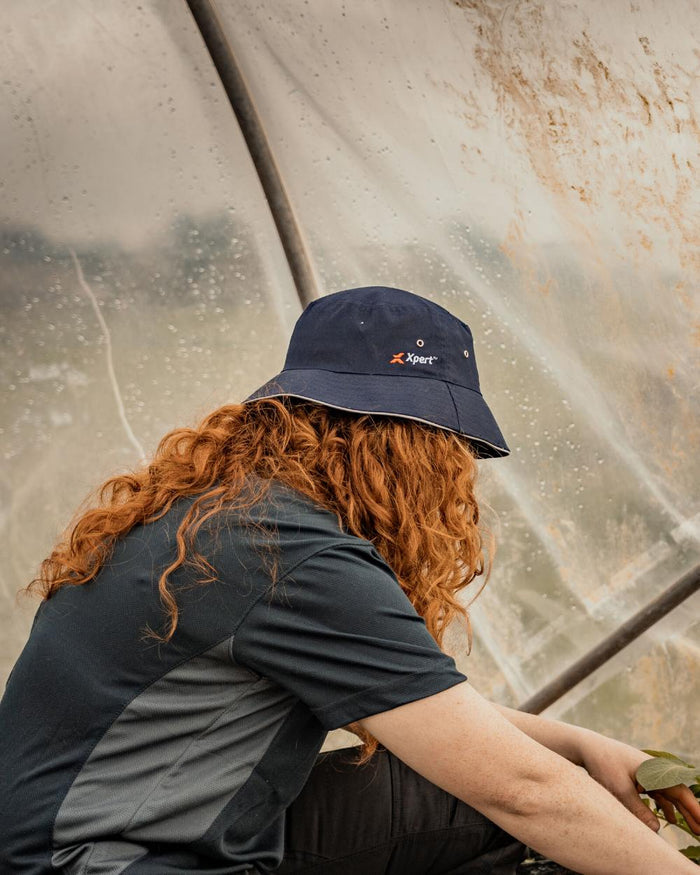Navy Coloured Xpert Core Bucket Hat on Outdoor Background
#colour_navy