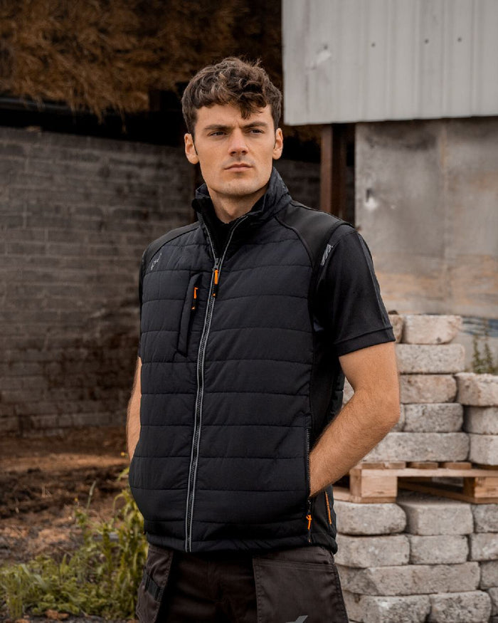 Black Coloured Xpert Mens Pro Rip-Stop Panelled Bodywarmer on Outdoor Background
#colour_black