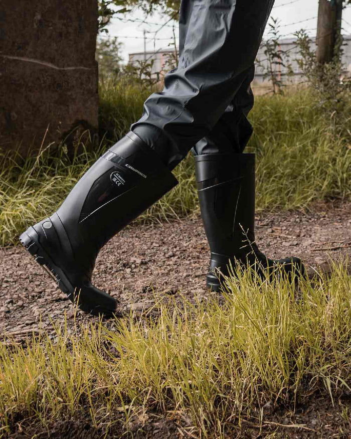 Black Coloured Xpert Mens Swampmaster Titan S5 Safety PVC Wellingtons on Outdoor Background
#colour_black