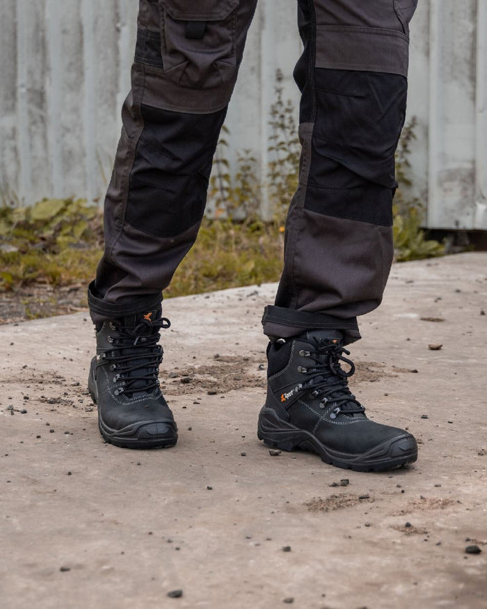 Black Coloured Xpert Mens Typhoon Waterproof Safety Boots on Outdoor Background
#colour_black