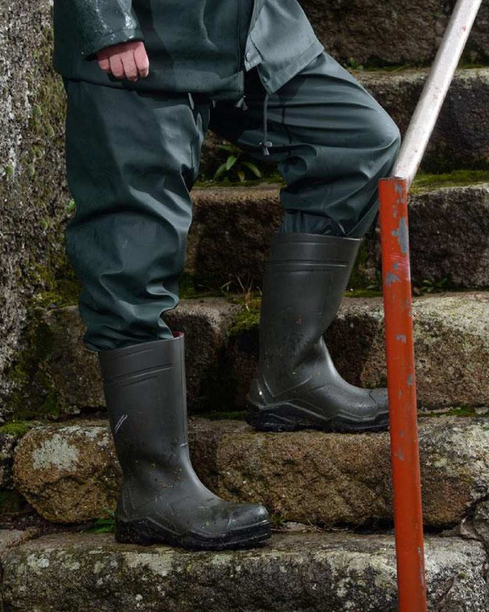 Green Coloured Xpert Swampmaster No-Sweat Stormgear Waterproof Trousers on Outdoor Background
#colour_green