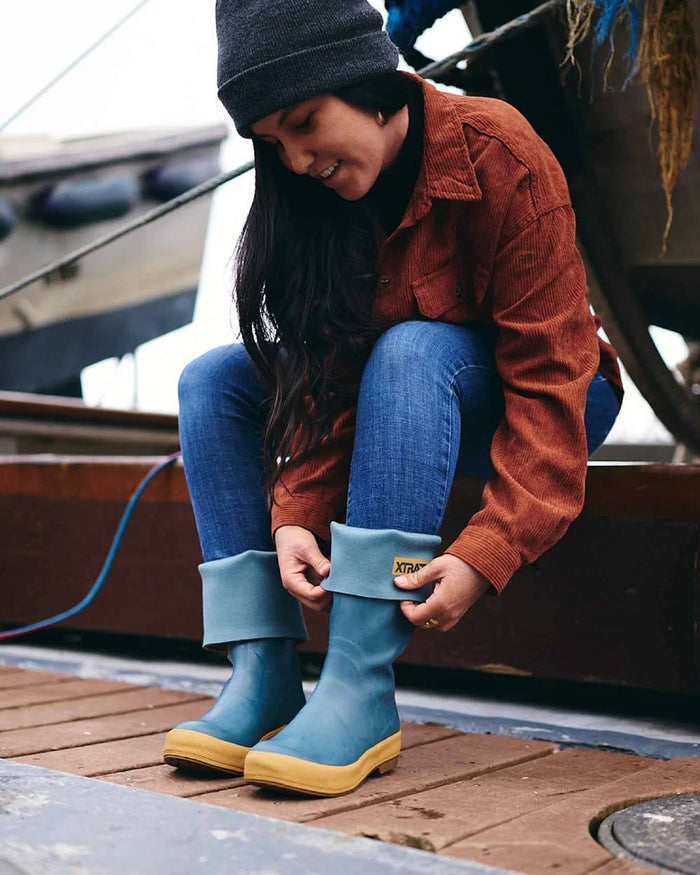 Marine Coloured Xtratuf Womens 15" Legacy Fishing Boots on outdoor background #colour_marine